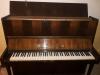 A vendre piano marque petrof 