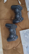 PlayStation 3 avec 2 manettes et cd