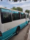 Toyota coaster 6 cylindre Bus 