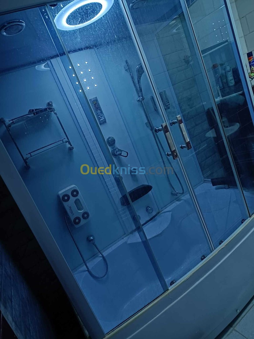 Cabine de douche et vaporisateur 