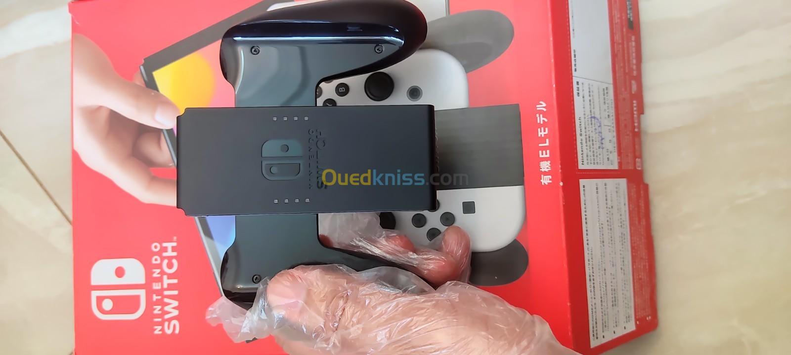 Nintendo Switch Oled 2023 + Film de protection + capuchons + Jeux
