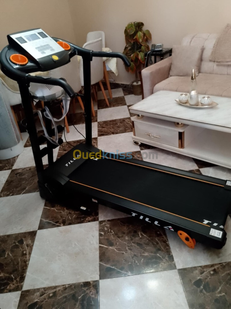 Tapis roulant avec vibreur masseur