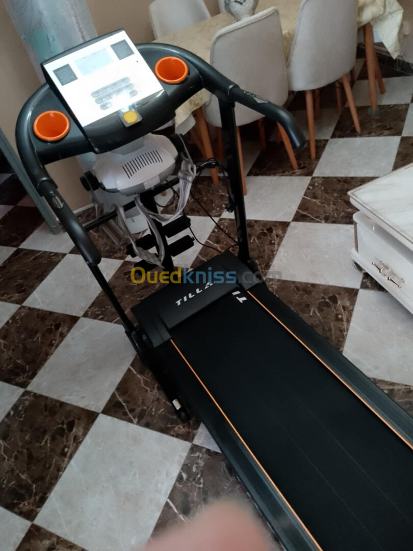 Tapis roulant avec vibreur masseur