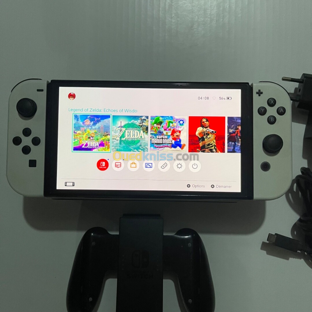 Nintendo switch oled flashé (puce) sd 128gb avec dock chargeur support 29 jeux installés 