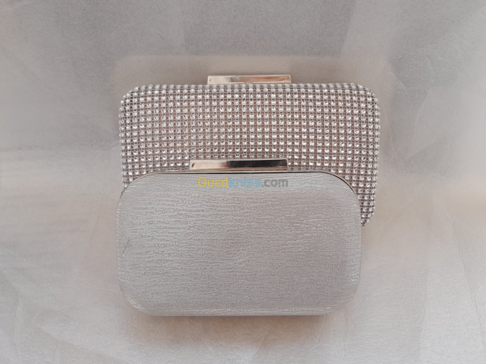 Pochette soirè argent  بوشات سواغي اغجو 