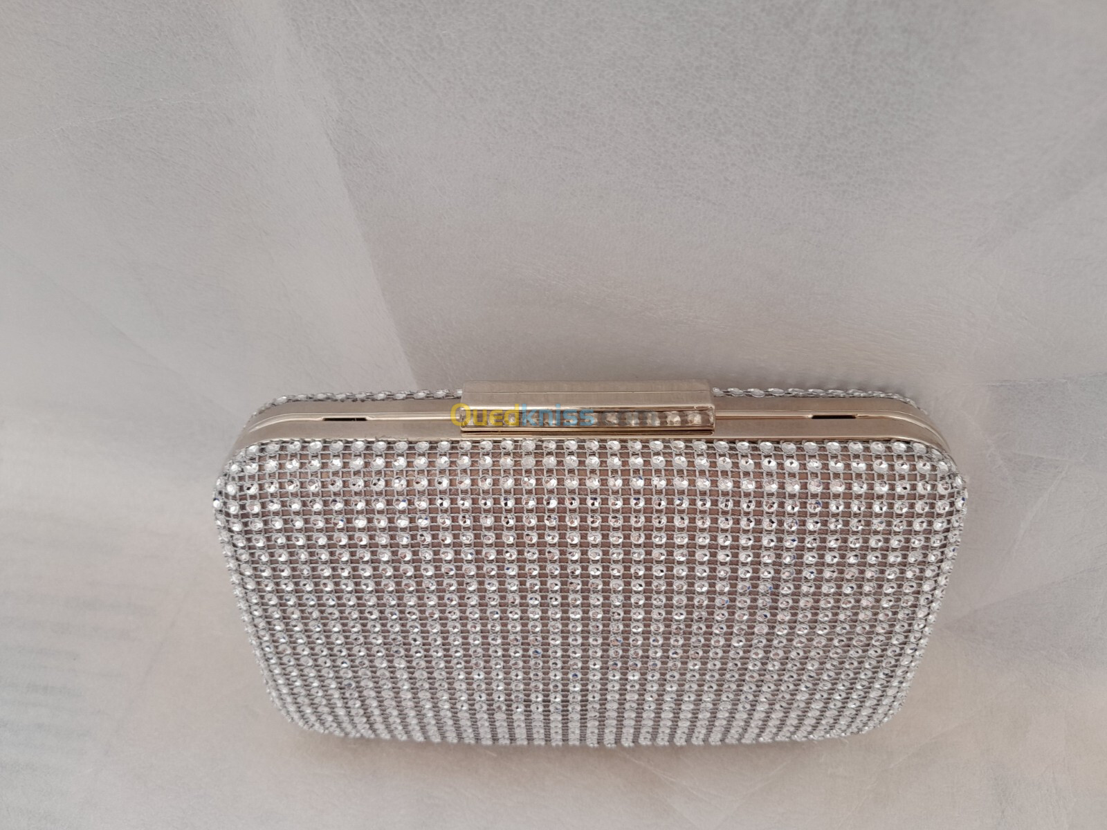 Pochette soirè argent  بوشات سواغي اغجو 