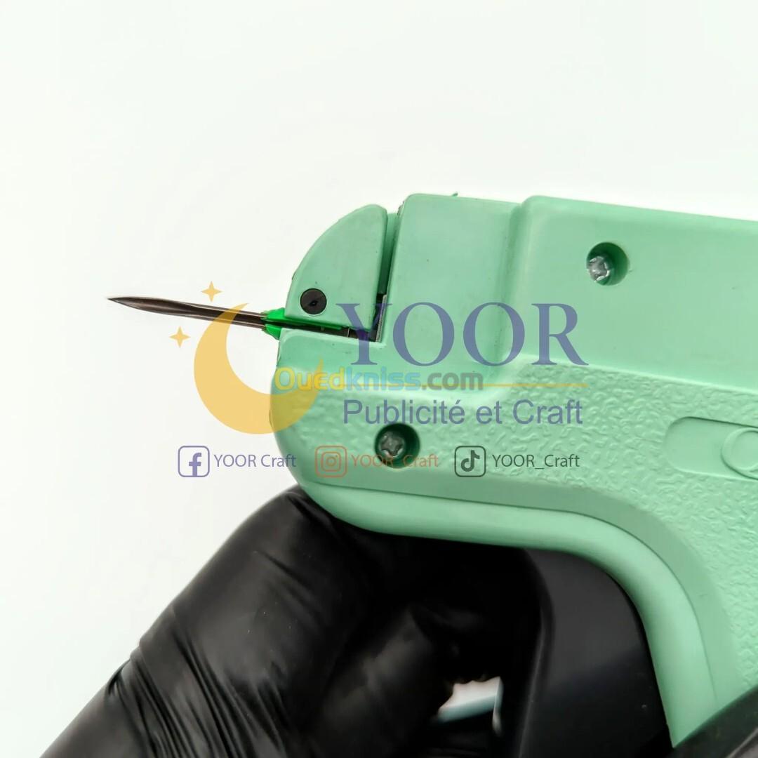 Pistolet etiquetage verte أداة وسم الألبسة عادية