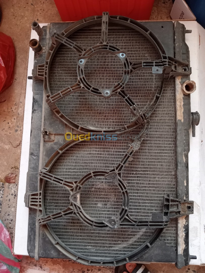 رادياتور نيسان صني ب10.. radiateur nissan sunny b10