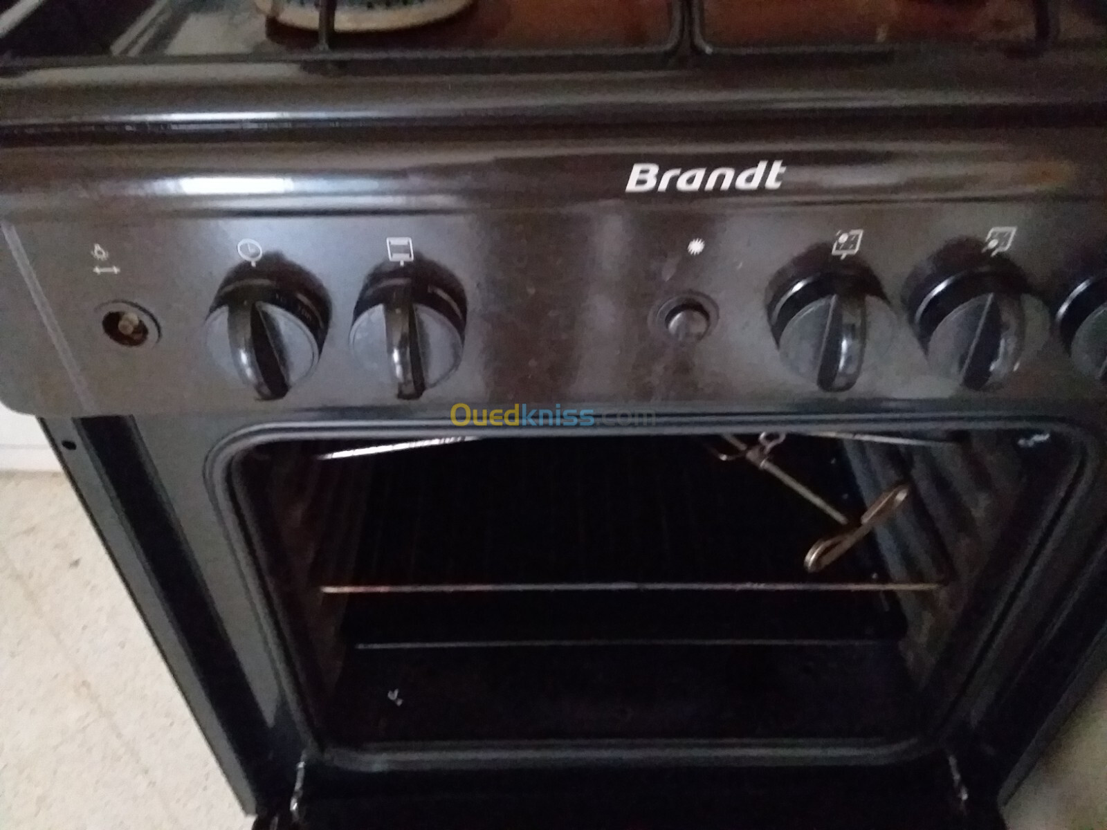 Cuisinière BRANDT 4 feux + Four, ToutGaz