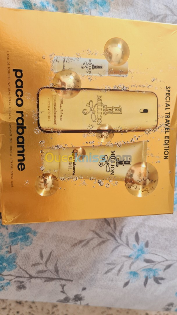 un coffrer de 3 pièce parfum paco rabanne 1 millon originale la 100 ml + shower Gel + spary 15 ml