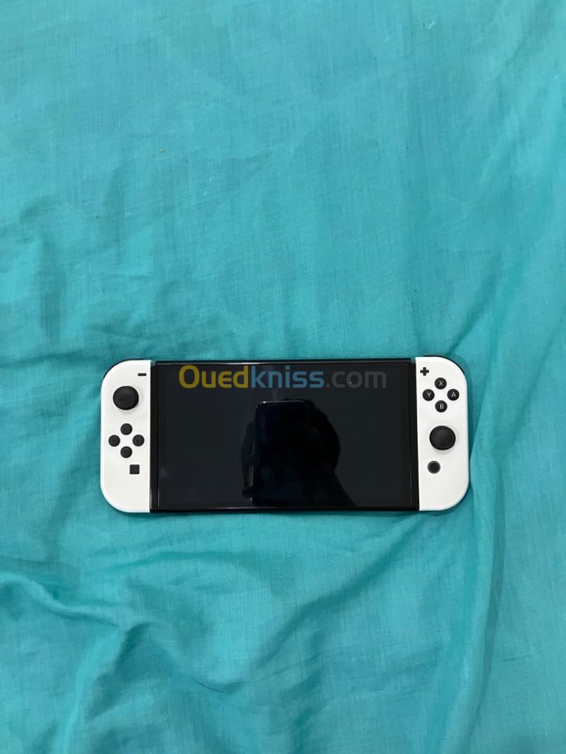 Switch oled plus jeux et pochette 