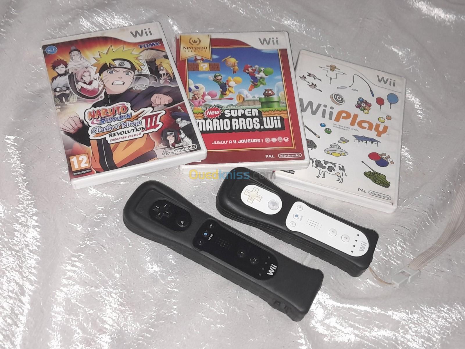 Wii avec 2 télécommande et 4 CD + un accessoire