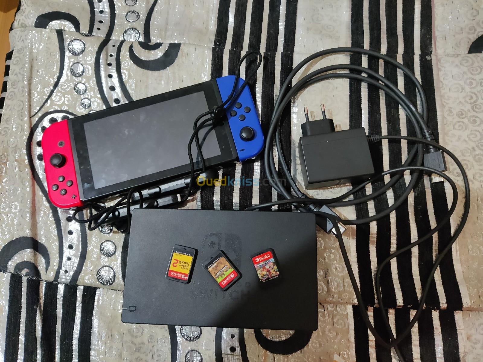 Je vends une Nintendo 1vec 3 jeux 