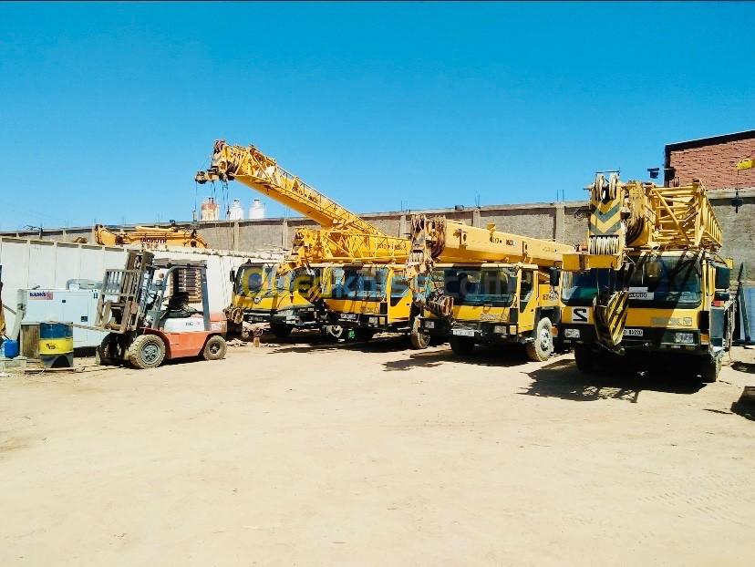 Location des grues différentes tonnages , mini pelle godet et brise roche ,mini compacteur 