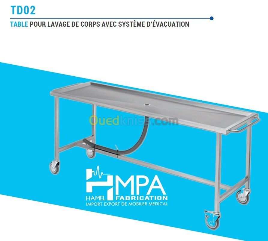 Table pour lavage de corps avec système d'évacuation