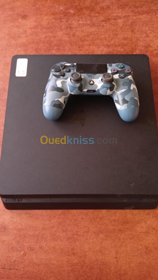 Ps4 flashée 1tb avec manette original