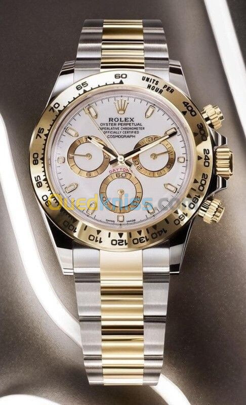 Montre Rolex Daytona gold silver