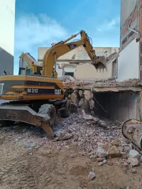 Location Pelle pneumatique Caterpillar M312 للكراء