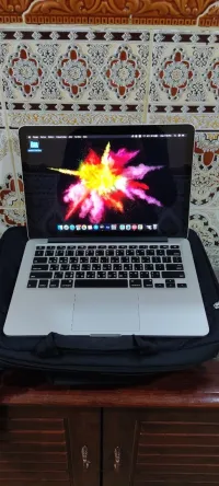Macbook pro2015 i5 8gb/256gb fih prblm baff jamais t7al 