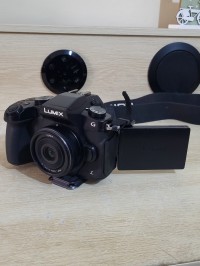 كاميرا-فيديو-panasonic-lumix-g80-appareil-photo-hybride-tropicalise-video-uhd-4k-objectif-g-14mm-f25-asph-capteur-43-16mp-double-stab-viseur-oled-ecran-orient-tactile-af-dfd-مستغانم-الجزائر
