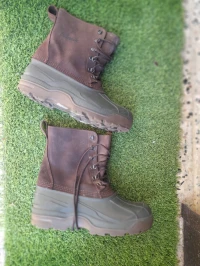 botte de type duck boot (souvent appelée bottes imperméables de chasse ou de neige. KAMIK