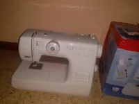آلة خياطة كهربائة