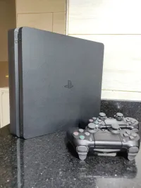 PS4 SLIM + 2 manette original+ 2cd