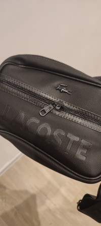 حقائب-سفر-sacoche-lacoste-noire-باش-جراح-الجزائر