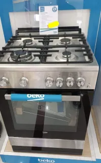 Cuisinière Beko inox Wok + Fonte