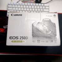 Camera Canon 250d avec chargeur et batterie original (avec la boite)