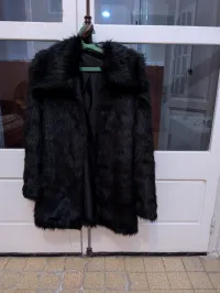 Veste noire pour femme très bonne occasion taille 38