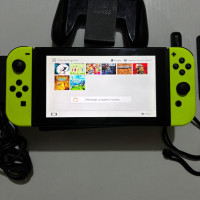 consoles-nintendo-switch-flashe-etat-1010-stockage-32128gb-avec-tout-ses-accessoires-aucune-probleme-oran-algerie