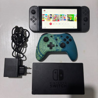 consoles-nintendo-switch-flashe-160gb-12832-avec-dock-chargeur-manette-et-16-jeux-oran-algerie