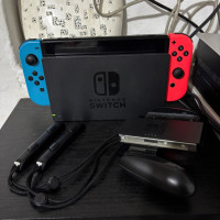 consoles-nintendo-switch-v2-2021-etat-1010-flashe-puce-sd-128gb-plein-des-jeux-oran-algerie