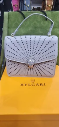 Prada chanelle Gutti Valentino hermes luis vitton