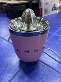 Press a grume Smeg 