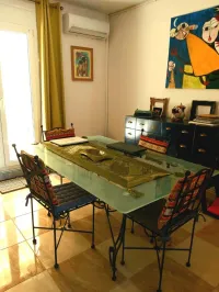 Table fer forgé et verre 