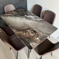 Tablé marbré luxe avec 6 chaises charleton en paollo