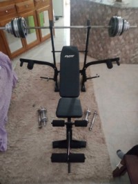 Banc de musculation avec 62kg + barre