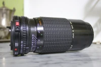 Objectif zoom Sigma K III 75 - 210 mm pour Canon (Monture FD)