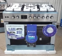 CUISINIERE ARTHUR MARTIN 6F 90CM INOX 2 WOK AFF FONT DOUBLE VENTILEE