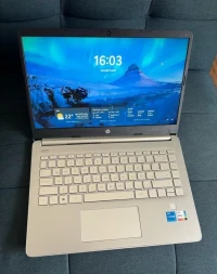 PC portable HP 14-dq2xxx équipé d'un processeur Intel Core i5 de 11e génération.