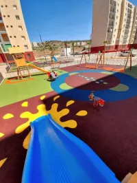 SOL AMORTISSANT revetement pour aire de jeux et parcs