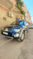 voitures-mitsubishi-l200-2013-doube-cabine-evolution-oued-sly-chlef-algerie