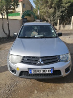 voitures-mitsubishi-l200-2013-doube-cabine-evolution-taghzout-bouira-algerie