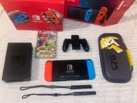 Nitendo Switch Neuf Jdida + 1 jeu Mario Party + Pochette Pokemon