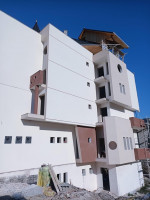 construction-travaux-regularisation-des-facades-monocouche-revatment-facade-et-monocouch-cheraga-alger-algerie