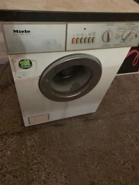 Machine à laver pour pièces