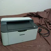 طابعة Brother HL-1110 مستعملة تمشي 10/10 imprimante