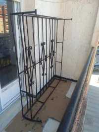 Protection en barreaux métalliques 